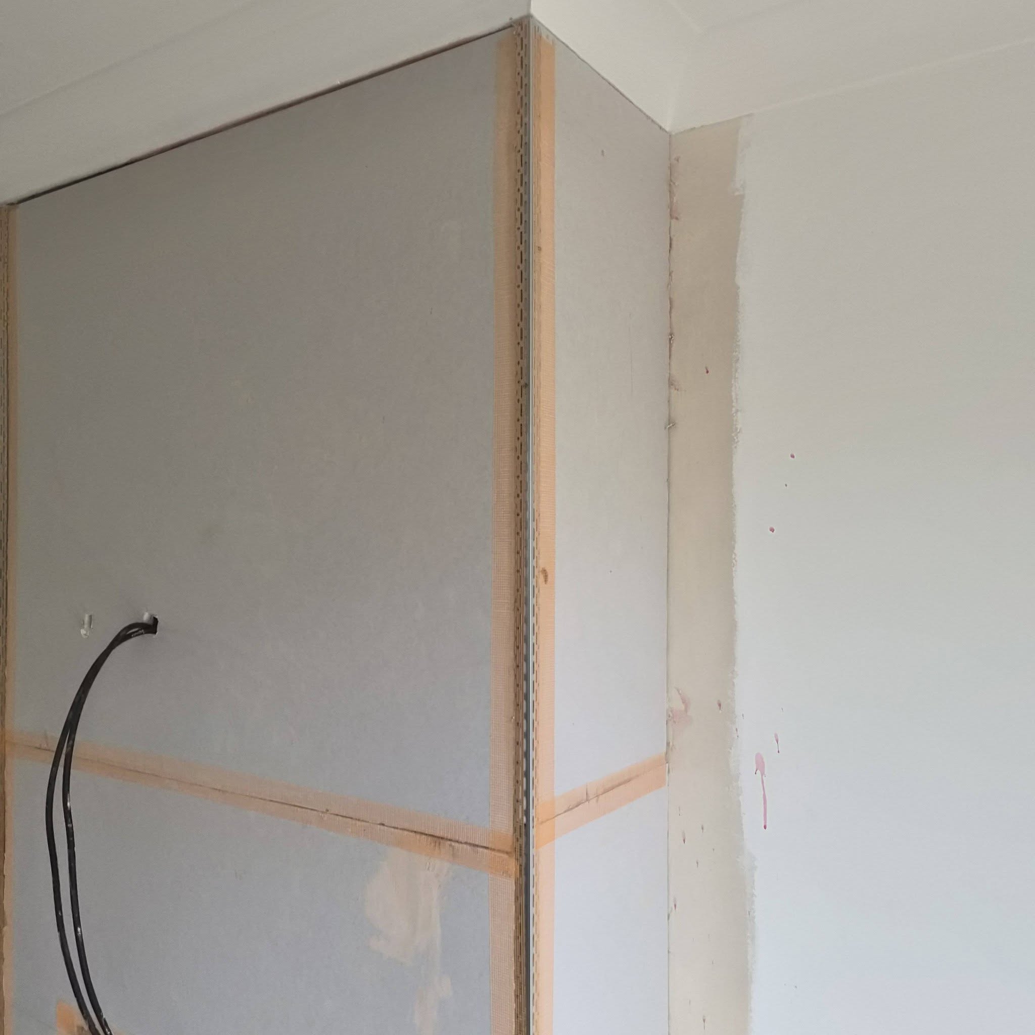 Chimney breast plastering before